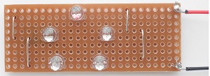 Soldering required for this track board kit of five sparkling l.e.d.s arranged in the shape of a pentagon.