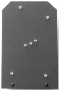 A foam board kit of seven sparkling l.e.d.s arranged in the pattern of the brightest stars in the constellation of Orion.